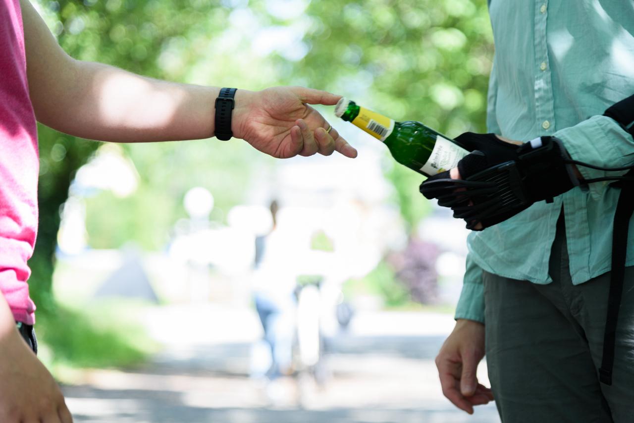 Passing a beer bottle